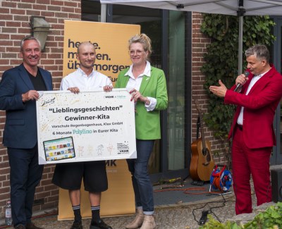 v.l.: Jens Mattern (Polylino), Mateusz Nowarkiewicz, Susan Richter (beide Regenbogenhaus), Lars Békési (VKMK)